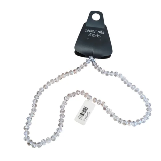 Glass bead string, faceted, rondelle, 5x7mm, clear AB, 40cm